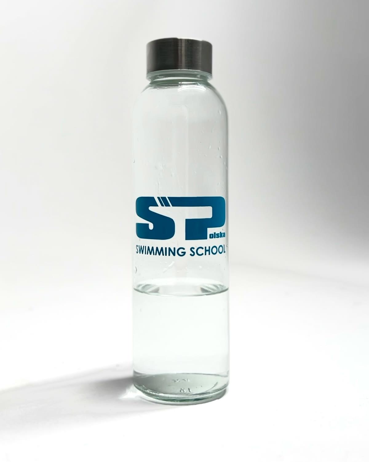 Glass bottle with the blue SP Swimming School logo